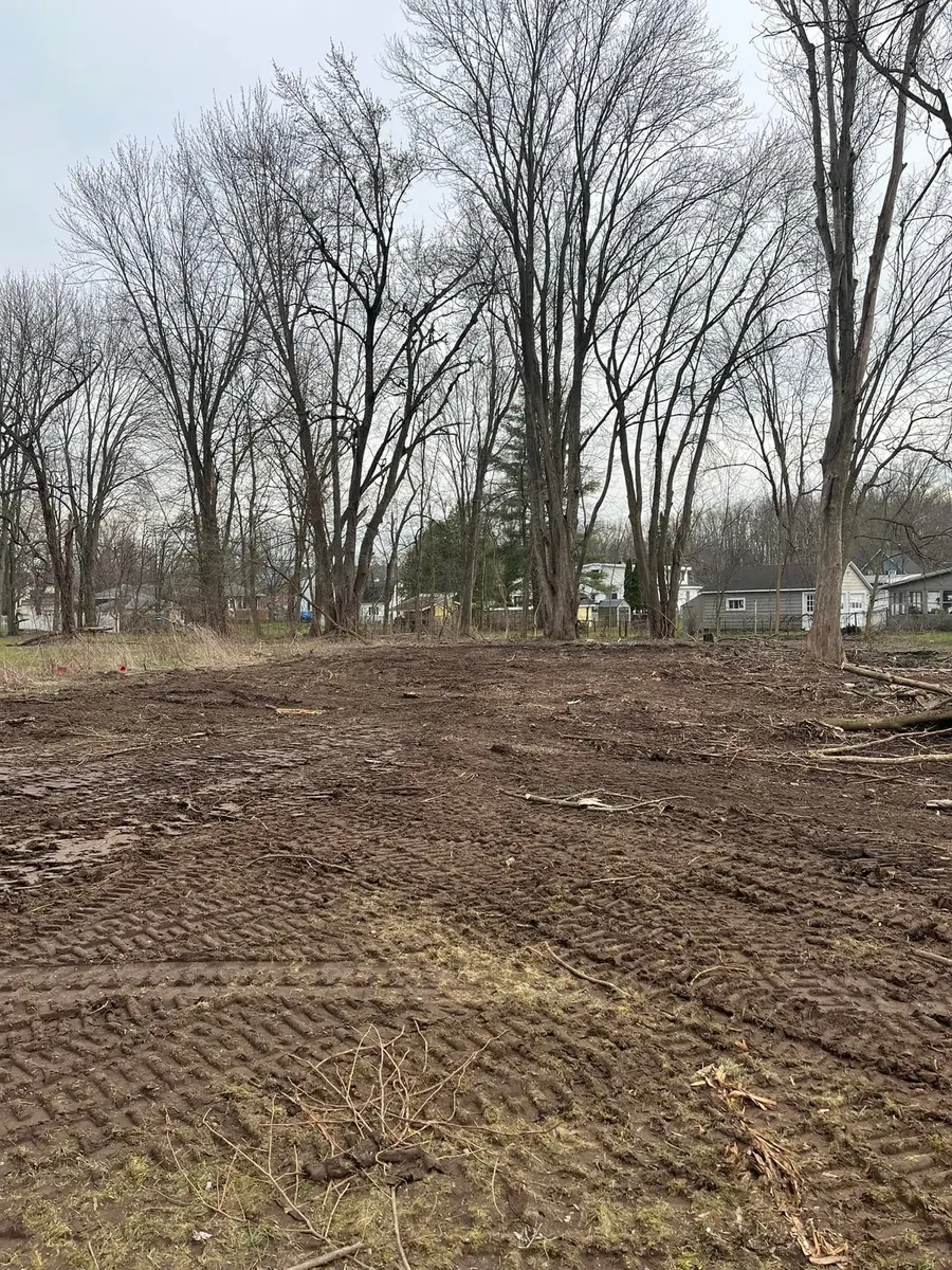 Cleared and rough graded lot ready for work