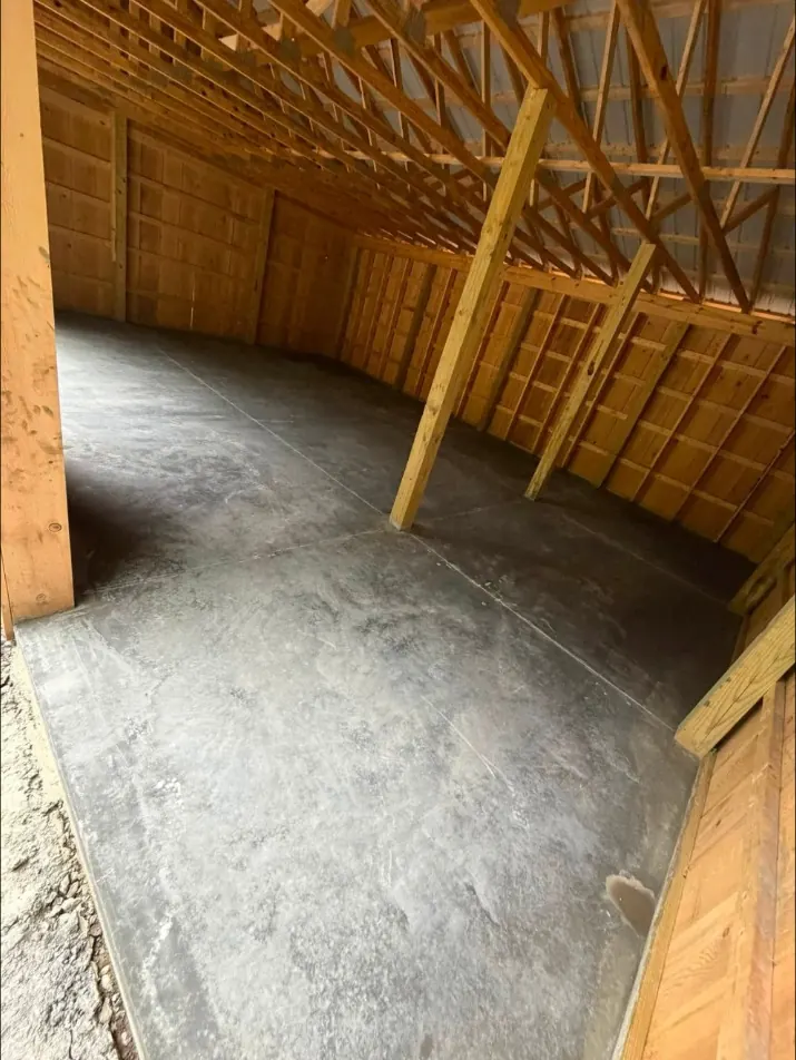 Finished concrete floor inside a pole building